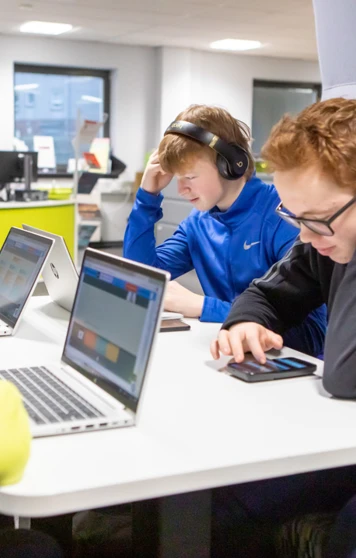 Group of students working on laptops and mobile devices in the Library and Flexible Learning Centre at Glasgow Kelvin College’s Easterhouse Campus. Group of students working on laptops and mobile devices in the Library and Flexible Learning Centre at Glasgow Kelvin College’s Easterhouse Campus.